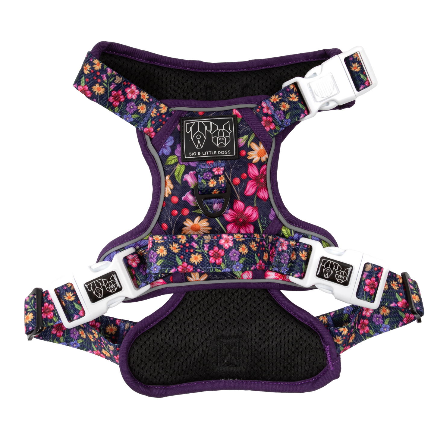 A floral patterned dog harness with adjustable straps, reflective trim, and branded buckles.