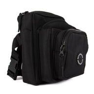 A black training pouch with multiple compartments, a branded rubber poop bag dispenser, and a key leash attached.